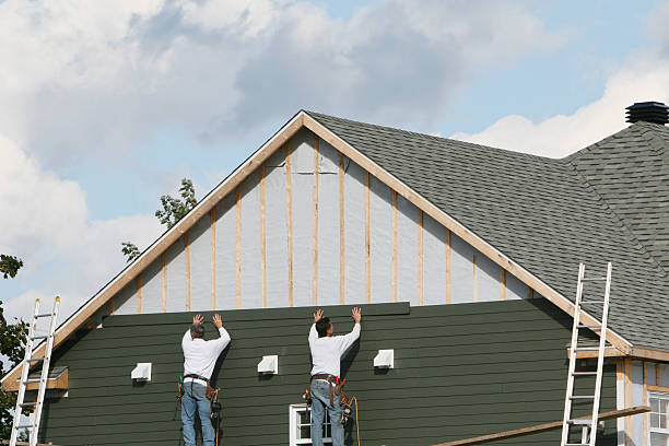 Professional Siding technician working in Clinton, IN